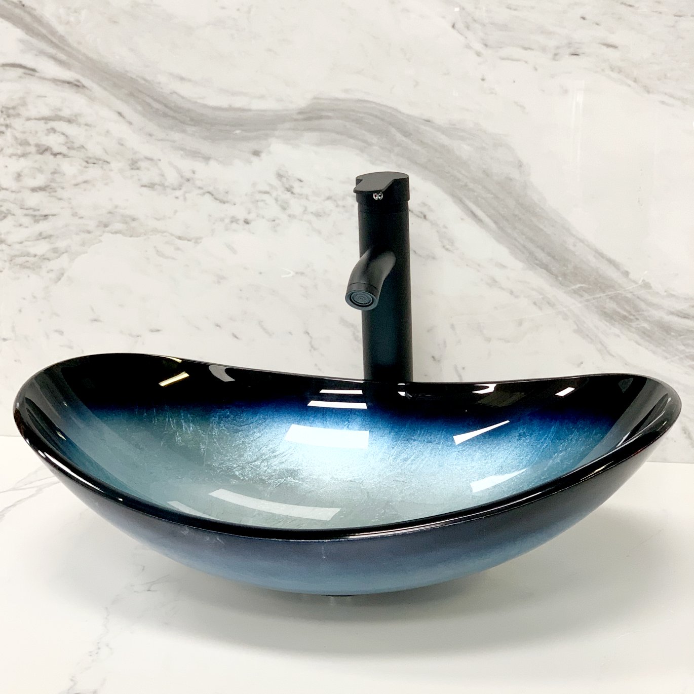 blue vessel glass sink