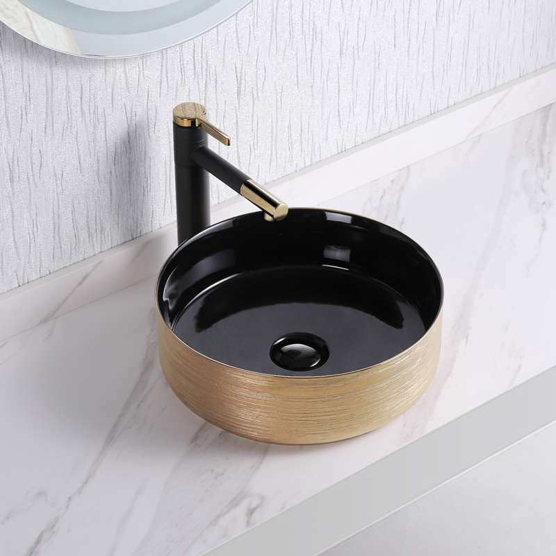round elegant gold and black ceramic sink